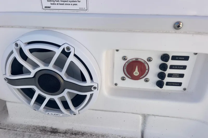 Slide: The Image of Speaker and control panel on 2021 Everglades 243 Center Console boat. - 18