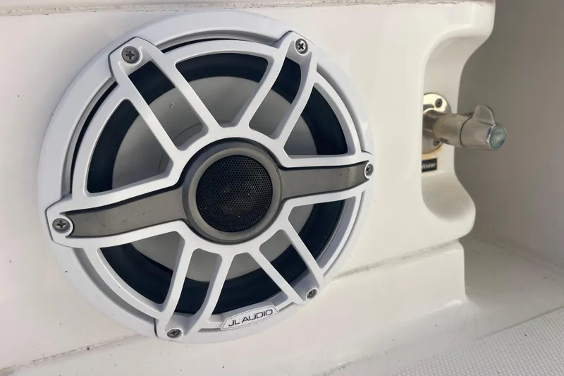Slide: The Image of Close-up of JL Audio speaker on 2021 Everglades 243 Center Console boat. - 19