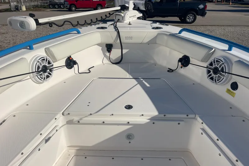 Slide: The Image of 2021 Everglades 243 Center Console boat interior with speakers and seating. - 31