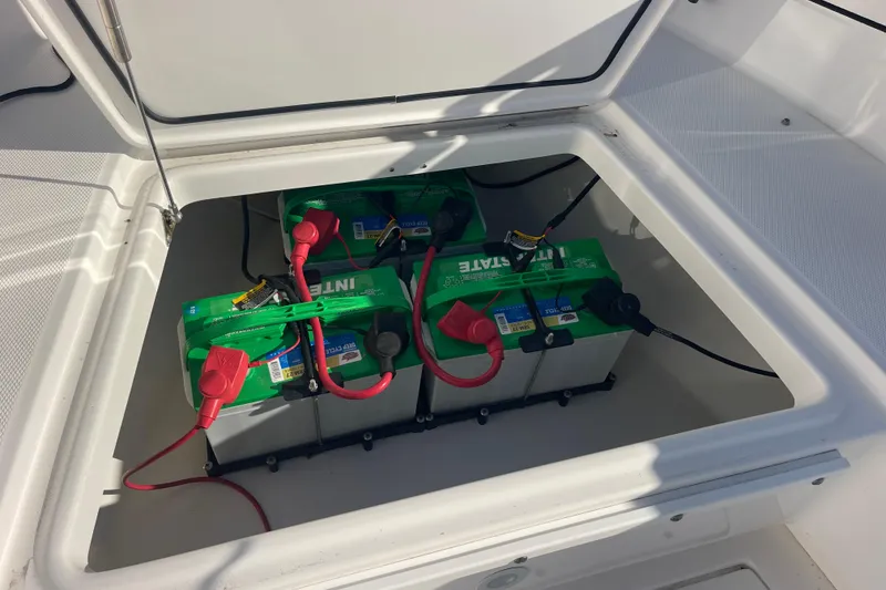 Slide: The Image of Battery compartment of 2021 Everglades 243 Center Console boat with Interstate batteries. - 37