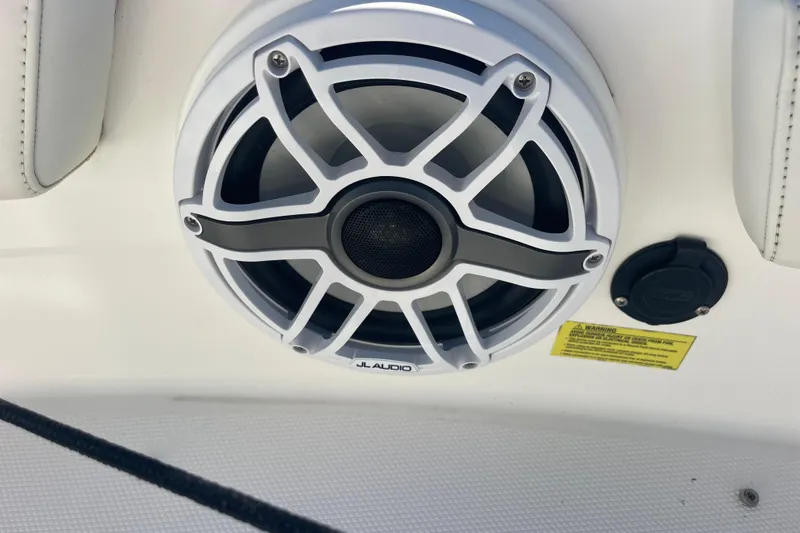 Slide: The Image of JL Audio speaker on 2021 Everglades 243 Center Console boat. - 41