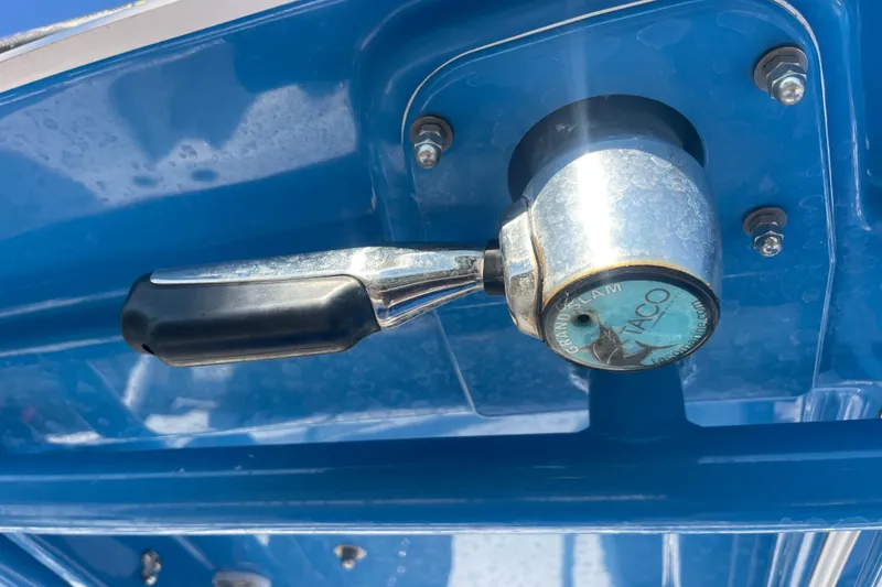 Slide: The Image of Close-up of a TACO Grand Slam handle on a 2021 Everglades 243 Center Console boat. - 48