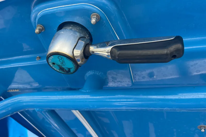Slide: The Image of Close-up of a 2021 Everglades 243 Center Console boat handle mechanism. - 50