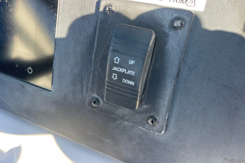 Slide: The Image of Switch for jackplate control on 2021 Everglades 243 Center Console boat dashboard. - 6