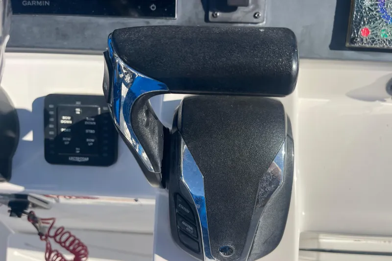 Slide: The Image of Throttle control of 2021 Everglades 243 Center Console boat, featuring modern design elements. - 8