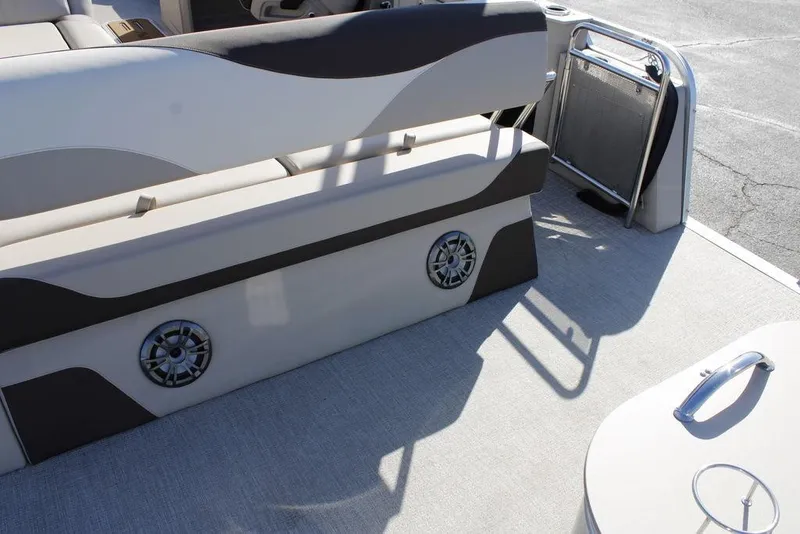 Slide: The Image of 2026 Avalon LSZ Cruise Rear Bench, 26-foot boat interior with stylish seating and speaker. - 12
