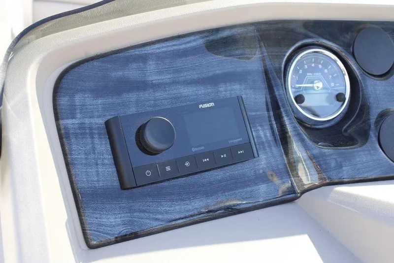 Slide: The Image of Dashboard of 2026 Avalon LSZ Cruise boat with Fusion audio system and gauge. - 17