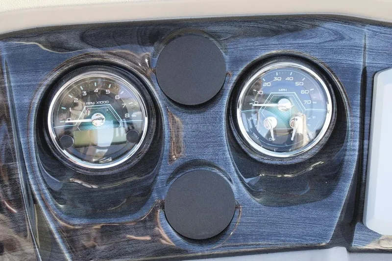 Slide: The Image of Dashboard of 2026 Avalon LSZ Cruise Rear Bench boat with RPM and speed gauges. - 23