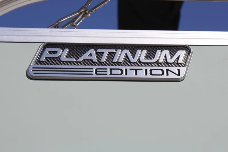 Slide: The Image of Platinum Edition badge on 2026 Avalon LSZ Cruise Rear Bench boat, showcasing luxury design. - 5