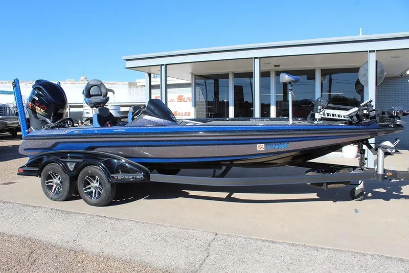 Slide: The Image of 2016 Skeeter FX21 Limited Edition bass boat parked outside dealership. - 0