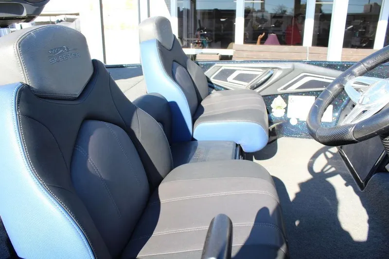 Slide: The Image of 2016 Skeeter FX21 Limited Edition boat interior with blue and gray seating. - 15