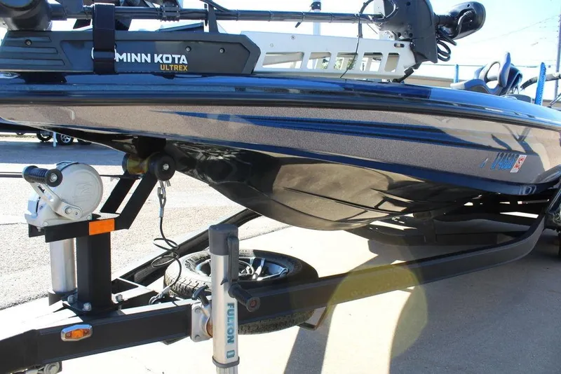 Slide: The Image of 2016 Skeeter FX21 Limited Edition boat on trailer with Minn Kota Ultrex motor. - 9