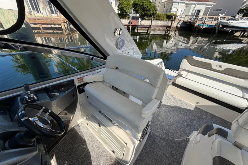 Slide: The Image of Interior of 2012 Monterey 400 Sport Yacht with helm and seating area. - 22