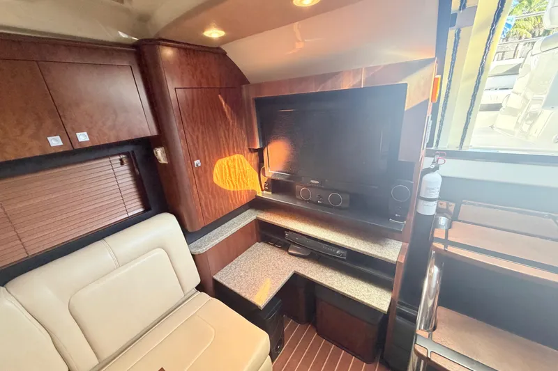 Slide: The Image of Interior of 2012 Monterey 400 Sport Yacht with TV and seating area. - 26