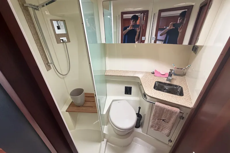 Slide: The Image of Bathroom interior of 2012 Monterey 400 Sport Yacht with shower and sink. - 33