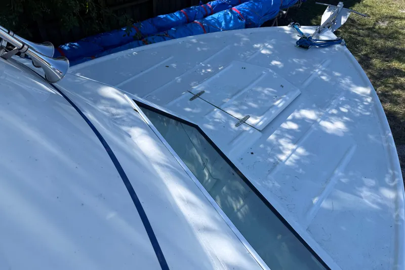 Slide: The Image of 1969 Custom Alglas Saint John 25 ft. Sportfisher boat deck with hatch and horn. - 7