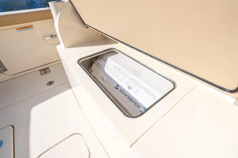 Slide: The Image of 2020 Scout 355 LXF boat featuring Seakeeper stabilizer system. - 43