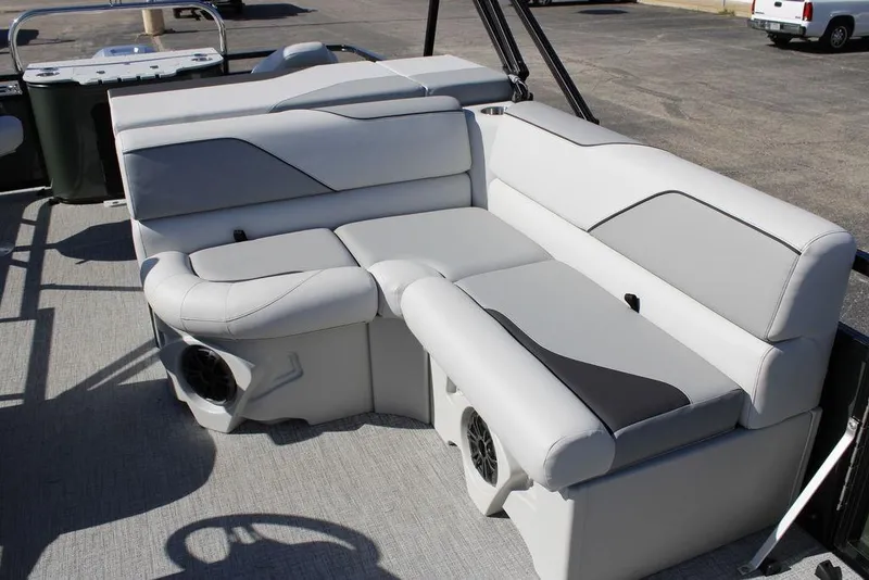 Slide: The Image of 2026 Avalon Venture 85 Rear Fish boat seating with modern design and integrated speakers. - 12