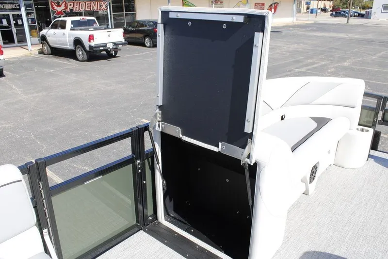 Slide: The Image of 2026 Avalon Venture 85 Rear Fish boat interior with open storage compartment. - 16