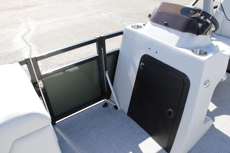 Slide: The Image of 2026 Avalon Venture 85 Rear Fish boat interior with steering console and seating. - 18