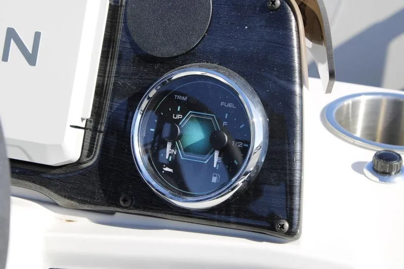 Slide: The Image of Dashboard gauge of 2026 Avalon Venture 85 Rear Fish boat, showing trim and fuel levels. - 20