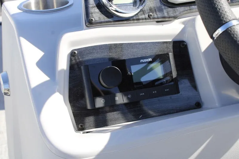 Slide: The Image of Control panel of 2026 Avalon Venture 85 Rear Fish boat with Fusion audio system. - 21
