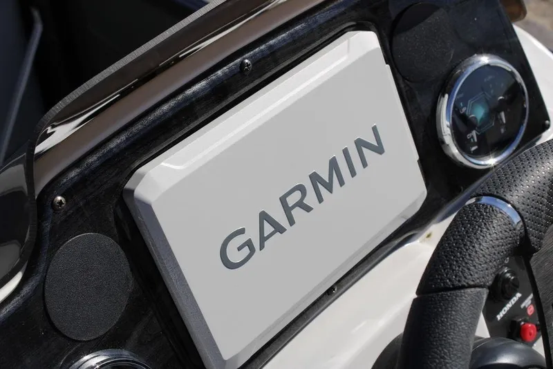Slide: The Image of Garmin navigation system on 2026 Avalon Venture 85 Rear Fish boat dashboard. - 22
