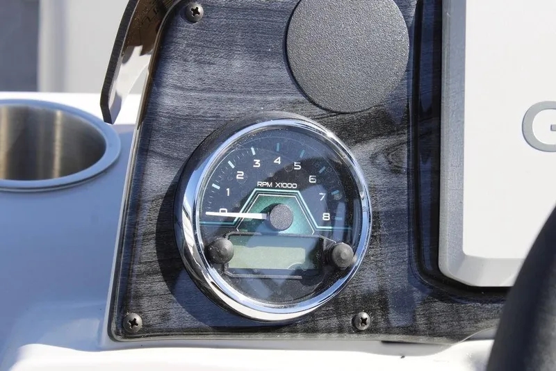 Slide: The Image of Tachometer on 2026 Avalon Venture 85 Rear Fish boat dashboard, close-up view. - 26