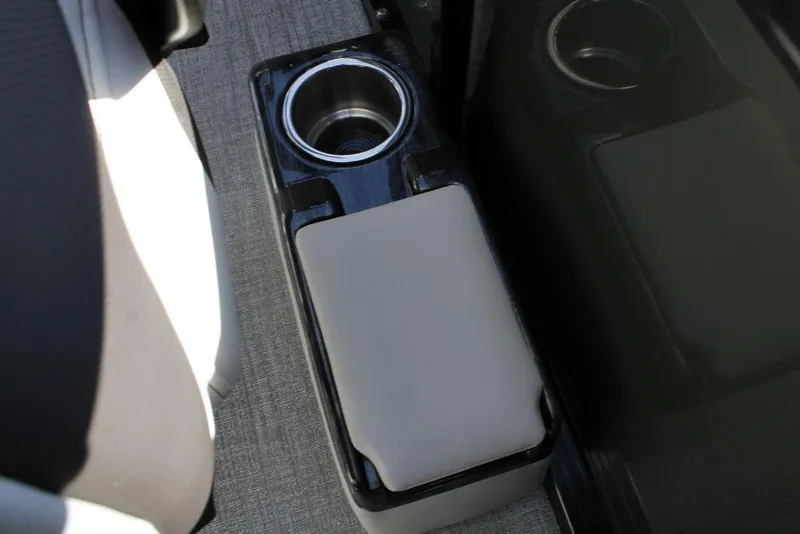 Slide: The Image of Cup holder and armrest in 2026 Avalon Venture 85 Rear Fish boat interior. - 28