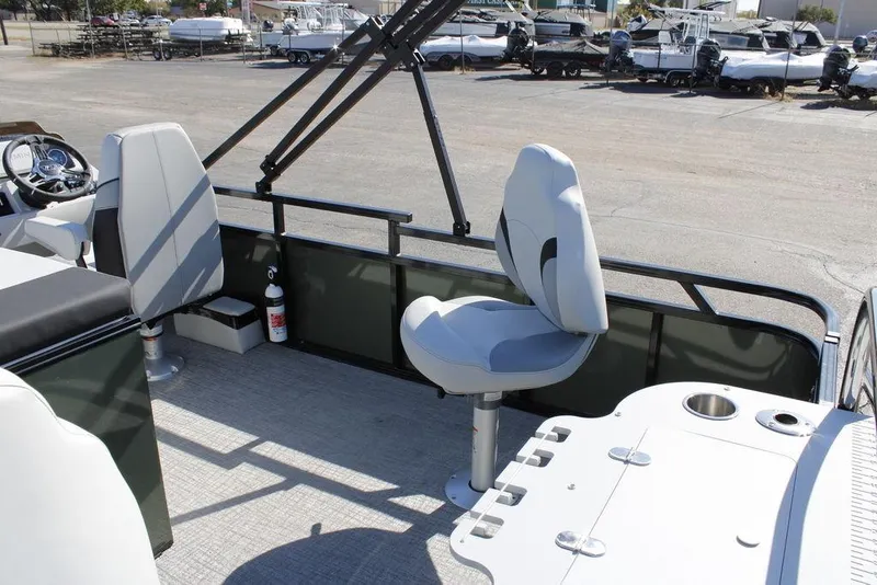 Slide: The Image of 2026 Avalon Venture 85 Rear Fish boat interior with seating and fishing setup. - 36