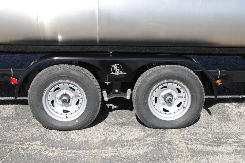 Slide: The Image of Dual wheels on a 2026 Avalon Venture 85 Rear Fish trailer. - 4