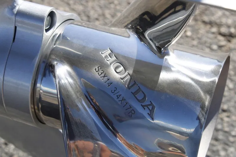 Slide: The Image of Close-up of a Honda propeller on a 2026 Avalon Venture 85 Rear Fish boat. - 9