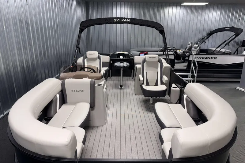 Slide: The Image of 2026 Sylvan Mirage X1 pontoon boat with spacious seating and modern design. - 1
