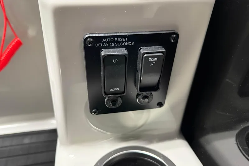 Slide: The Image of Control panel of 2026 Sylvan Mirage X1 with switches for dome light and auto reset. - 13