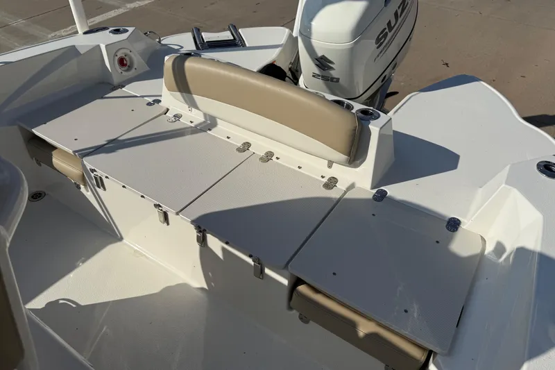 Slide: The Image of 2019 Stingray 236 CC boat interior with Suzuki 250 engine. - 12