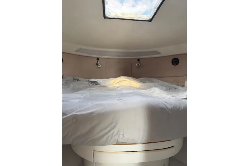 Slide: The Image of Interior cabin of 1988 Trojan 13 Meter Express 430 with skylight and bed. - 13