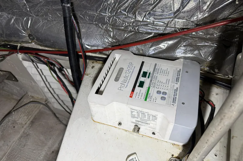 Slide: The Image of Battery charger in 1988 Trojan 13 Meter Express 430 boat engine room. - 49