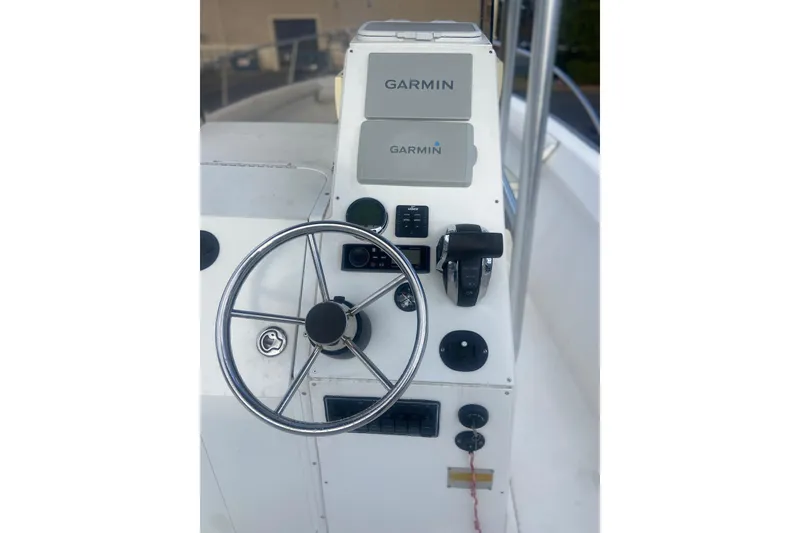 Slide: The Image of 2005 Key Largo 236 Center Console boat helm with Garmin navigation system. - 13