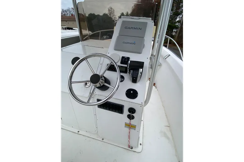 Slide: The Image of 2005 Key Largo 236 Center Console helm with Garmin navigation system. - 3