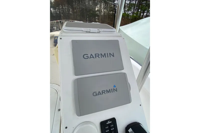 Slide: The Image of 2005 Key Largo 236 Center Console with Garmin navigation displays. - 4