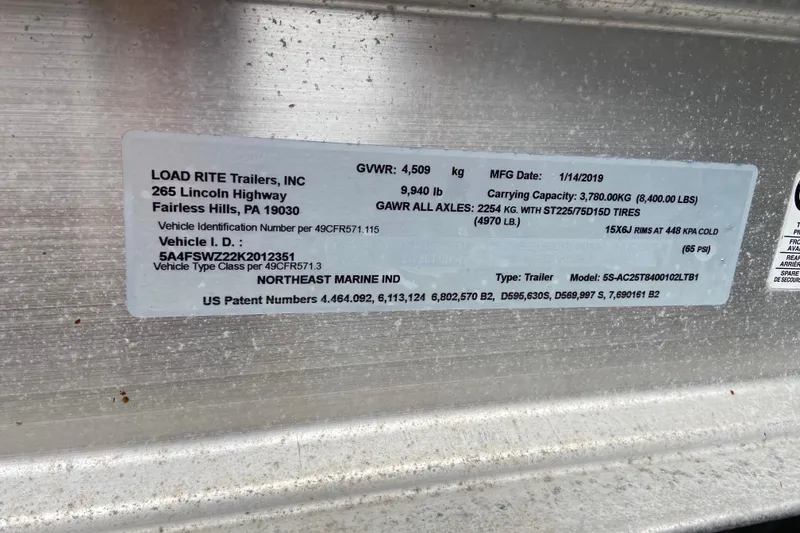 Slide: The Image of Label on Load Rite trailer with specifications and manufacturing details. - 5