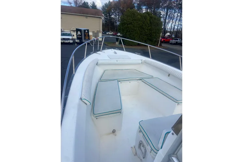 Slide: The Image of 2005 Key Largo 236 Center Console boat with spacious seating and sleek design. - 7
