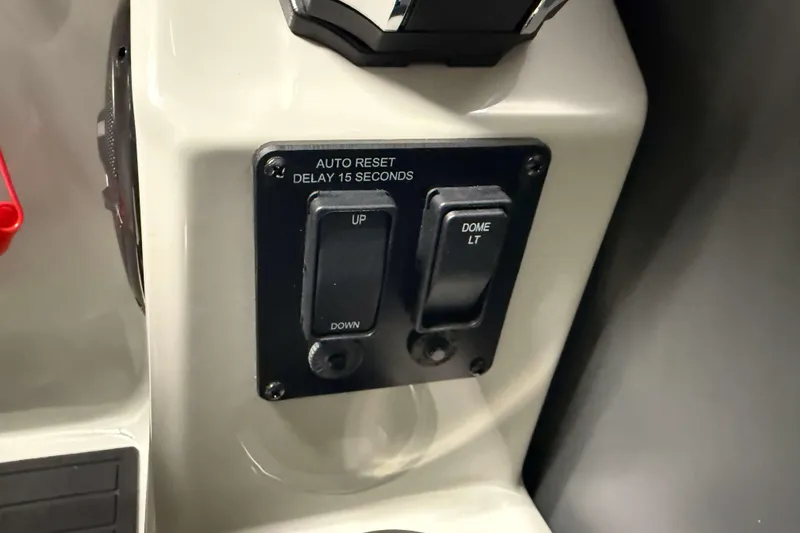 Slide: The Image of Control panel of 2026 Sylvan Mirage X1 with auto reset and dome light switches. - 13