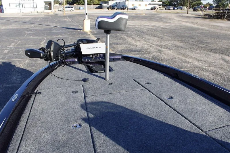 Slide: The Image of 2026 Phoenix 21 boat deck with Garmin equipment in a parking lot. - 10