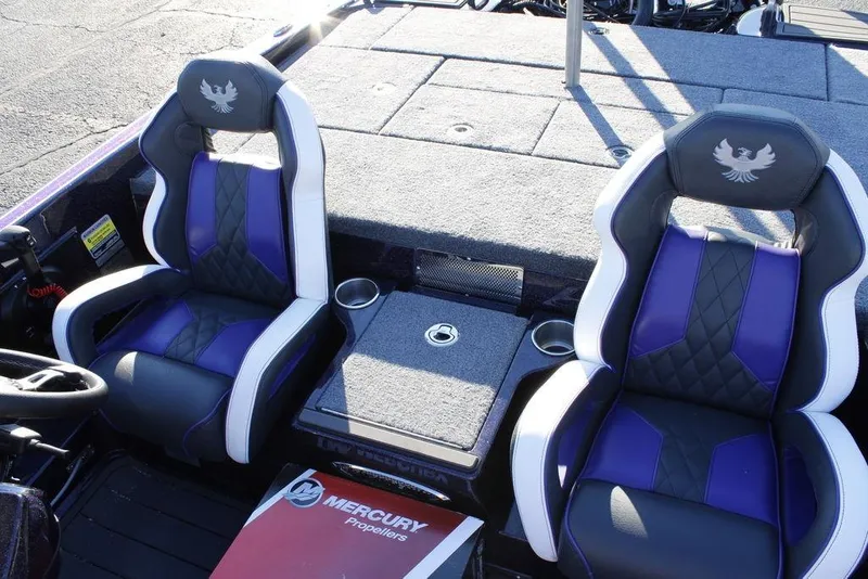 Slide: The Image of 2026 Phoenix 21 boat interior with purple and black seats, featuring Mercury Propellers branding. - 12