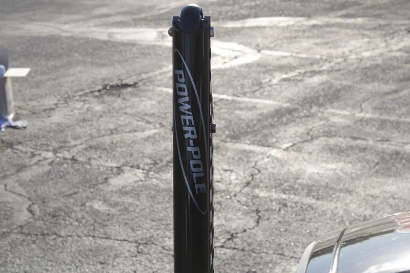 Slide: The Image of Power-Pole anchor on 2026 Phoenix 21 boat in parking lot. - 18