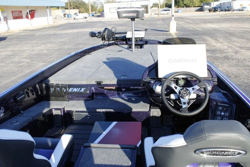 Slide: The Image of Interior of a 2026 Phoenix 21 boat with Garmin navigation system. - 20