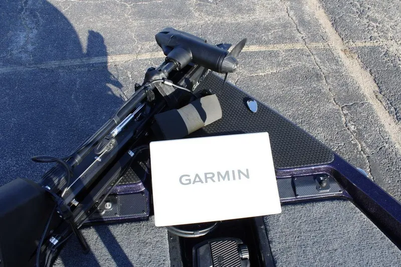 Slide: The Image of Trolling motor and Garmin device on 2026 Phoenix 21 boat deck. - 5