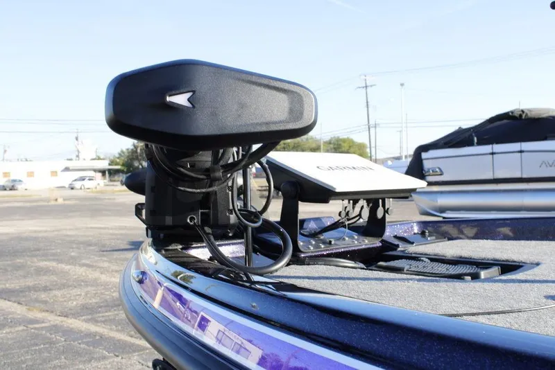 Slide: The Image of 2026 Phoenix 21 boat with advanced Garmin navigation system on deck. - 8