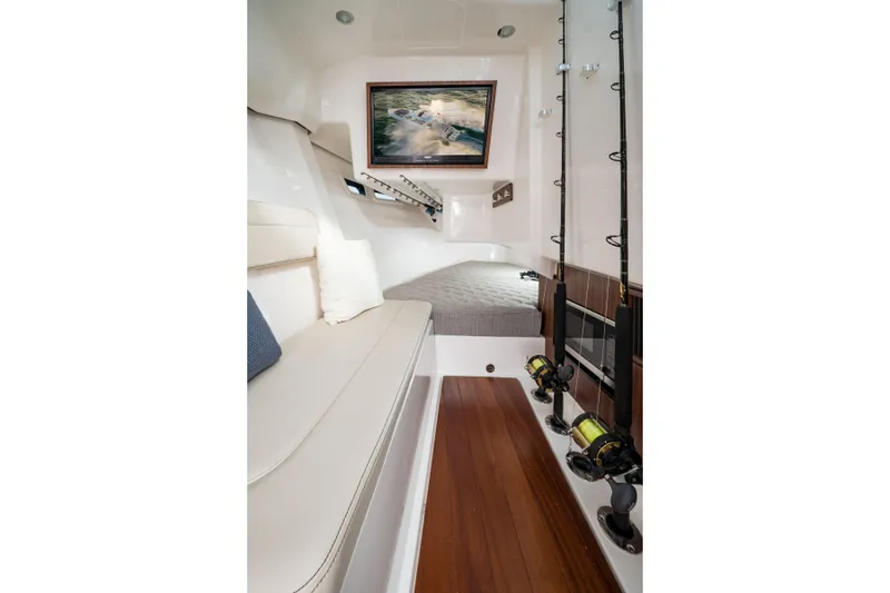 Slide: The Image of 2026 Pursuit DC 365 Dual Console helm with advanced navigation displays and controls. - 15